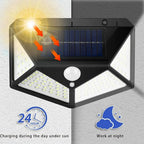Solar-powered outdoor light with charging and working indicators on a gray background
