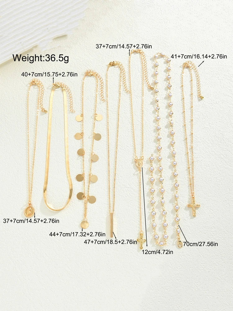 Six gold-toned necklaces displayed on a light textured background with overlaid length measurements and weight text.