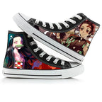 Pair of black high-top sneakers with anime character prints on a white background