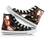 Black high-top sneakers with anime character designs on a white background
