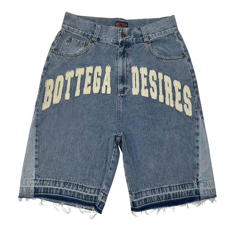 Blue denim shorts with 'Bottega Desires' text on a white background