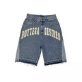 Denim shorts with 'Bottega Desires' text on a white background