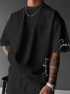 Boxy Fit Cursive Letter Something Print T-shirt