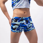 Blue camouflage underpants shorts worn by a person on a white background