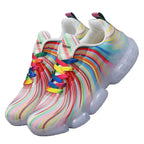 Colorful striped sneakers with rainbow laces on a white background