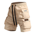 Beige cargo shorts with multiple pockets and a visible brand logo on a white background