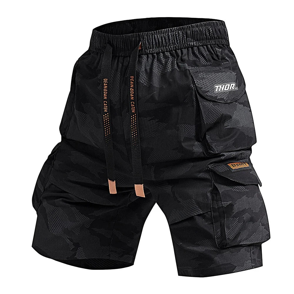 Black camouflage cargo shorts with 'Thor' branding on a white background