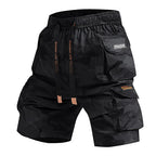 Black camouflage cargo shorts with 'Thor' branding on a white background