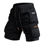 Black cargo shorts with multiple pockets and 'Thor' branding on a white background