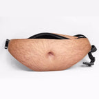 A novelty fanny pack designed to look like a hairy human belly, with a black zipper and black adjustable strap, shown on a plain white background.