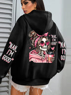 Black hoodie with a skeleton design and text on the back, worn by a person.
