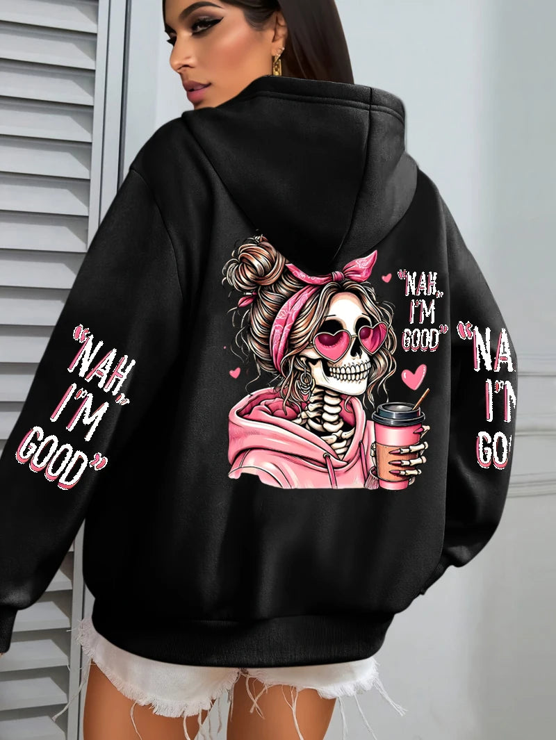 Black hoodie with a skeleton design and text on the back, worn by a person.
