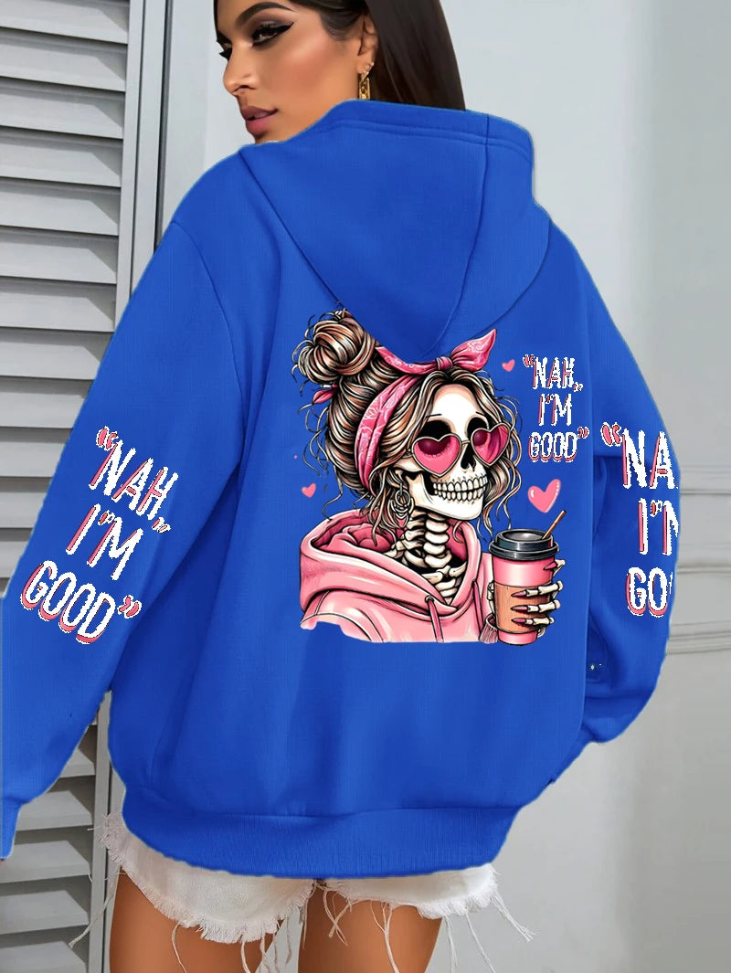 Blue hoodie with a skeleton design and text on the back, worn by a person.