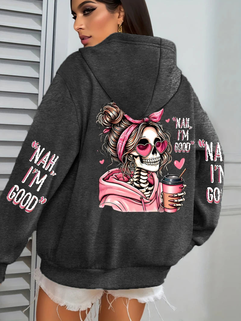 Gray hoodie with skeleton design and text on the back, worn by a person.