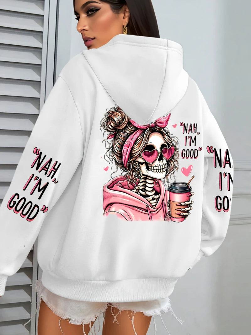 White hoodie with a skeleton design and text on the back, worn by a person.