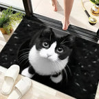 Black and white cat peeking from behind a glass door with a person's foot visible.