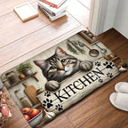Kitchen doormat with a cat design and 'Kitchen' text on a wooden floor.