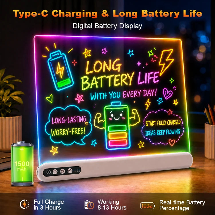 A neon-style digital battery display board on a white rectangular base, shown on a desk with a battery graphic and promotional text. The board glows with multicolor LED-like lines and symbols, including a battery icon, lightning bolts, stars, and phrases such as 'LONG BATTERY LIFE' and 'WITH YOU EVERY DAY!'.
