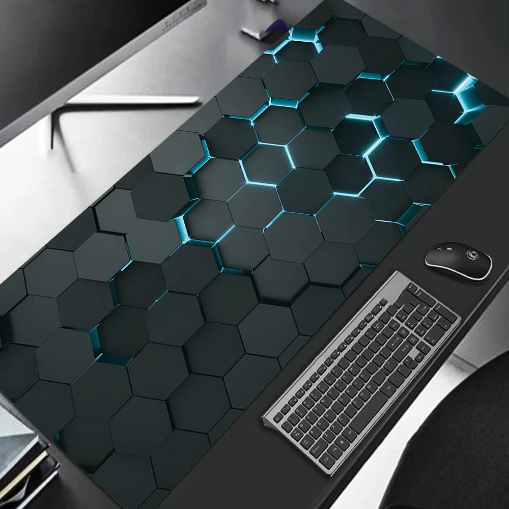 Desk setup with a hexagonal patterned desk pad, keyboard, and mouse.