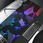 Geometric desk mat with colorful lighting on a desk setup