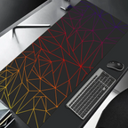Geometric patterned desk mat with keyboard, mouse, and monitor on a desk.