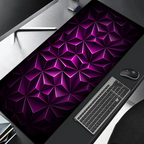 Desk setup with a large purple geometric patterned mouse pad, keyboard, and mouse.