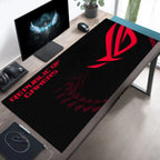 Gaming desk setup with a Republic of Gamers mouse pad.