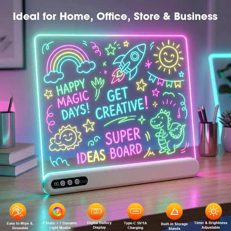 A neon-style LED magic board on a desk, glowing with colorful drawings and text including 'HAPPY MAGIC DAYS! GET CREATIVE! SUPER IDEAS BOARD.' The board is shown in a home office or store-like setting with books, pens, and ambient colored lighting.