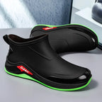 Black and green shoes with red 'DASH' logo on a gray surface