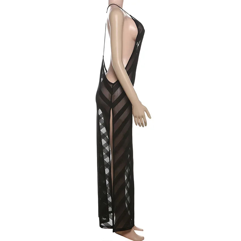 Black sheer dress on a mannequin against a white background