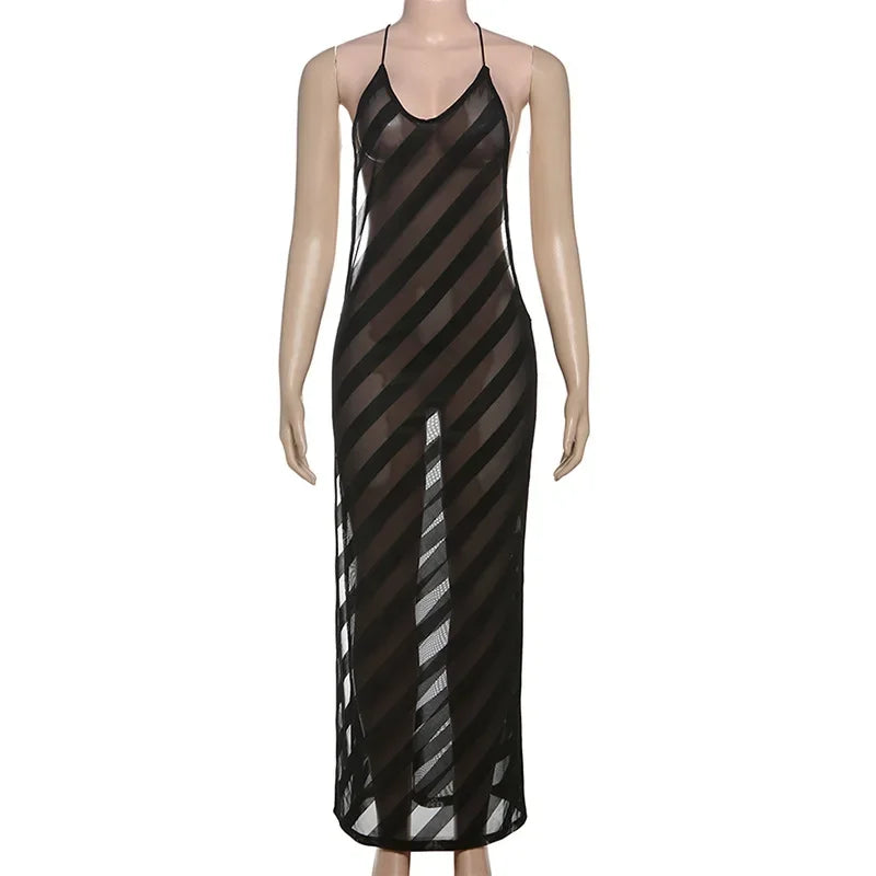 Mannequin wearing a black and white striped dress on a white background