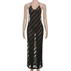 Mannequin wearing a black and white striped dress on a white background