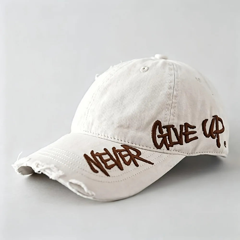 White cap with 'Never Give Up' text on a light gray background
