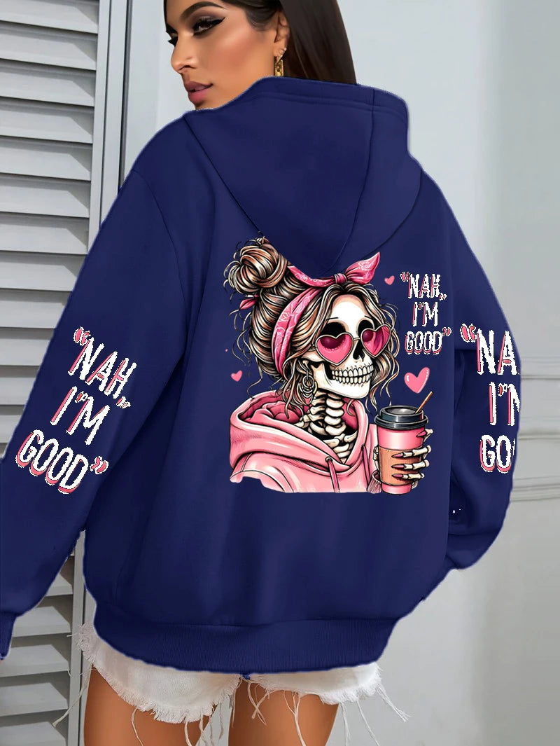 Navy blue hoodie with a skeleton design and text on the back, worn by a person.
