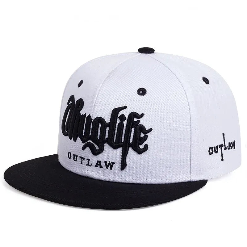 White and black cap with 'Thug life Outlaw' text on a white background