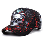 A black baseball cap featuring a detailed graphic print of silver skulls, red splatters, and dark wings on a white background.
