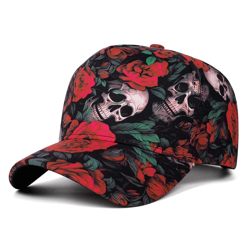 A baseball cap featuring a detailed print of red roses and human skulls on a black background, shown against a plain white studio background.