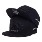 Black cap with 'Thug Life' and 'Outlaw' text on a white background