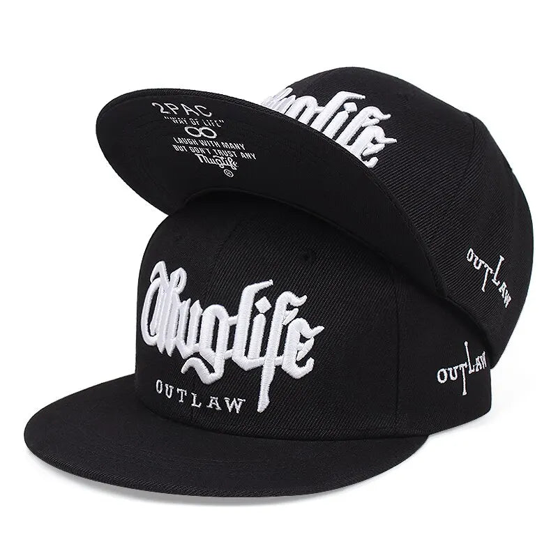 Black caps with 'Thug Life' and 'Outlaw' text on a white background.