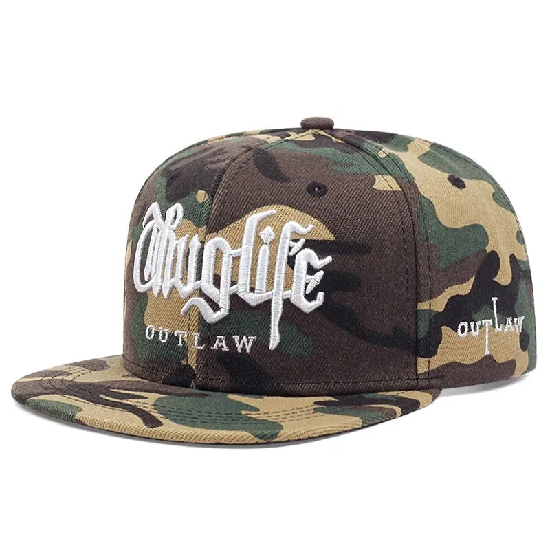 Camouflage baseball cap with Thug Life 'Outlaw' branding on a white background