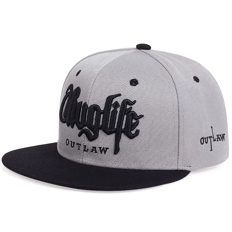 Gray and black cap with thug life outlaw branding on a white background