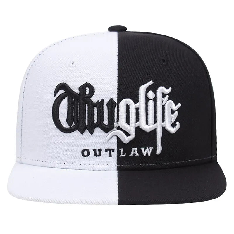 Black and white cap with Thug Life outlaw text on a white background