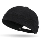 Black brimless tank baseball cap hat on a white background