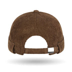 Brown ribbed brimless tang style cap on a white background