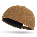 Brown brimless baseball cap tang hat on a white background
