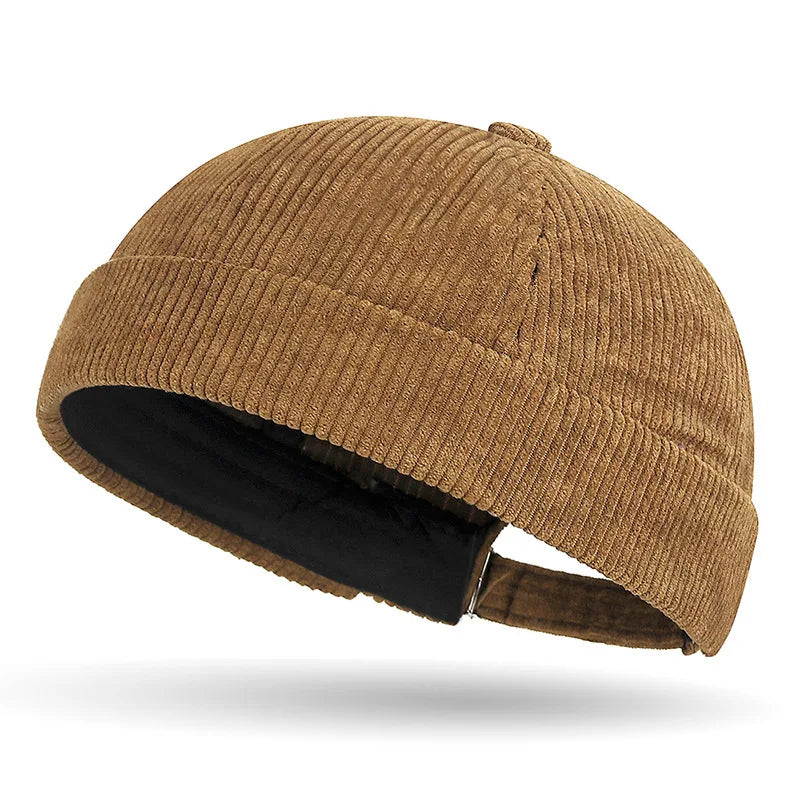 Brown brimless baseball cap tang hat on a white background