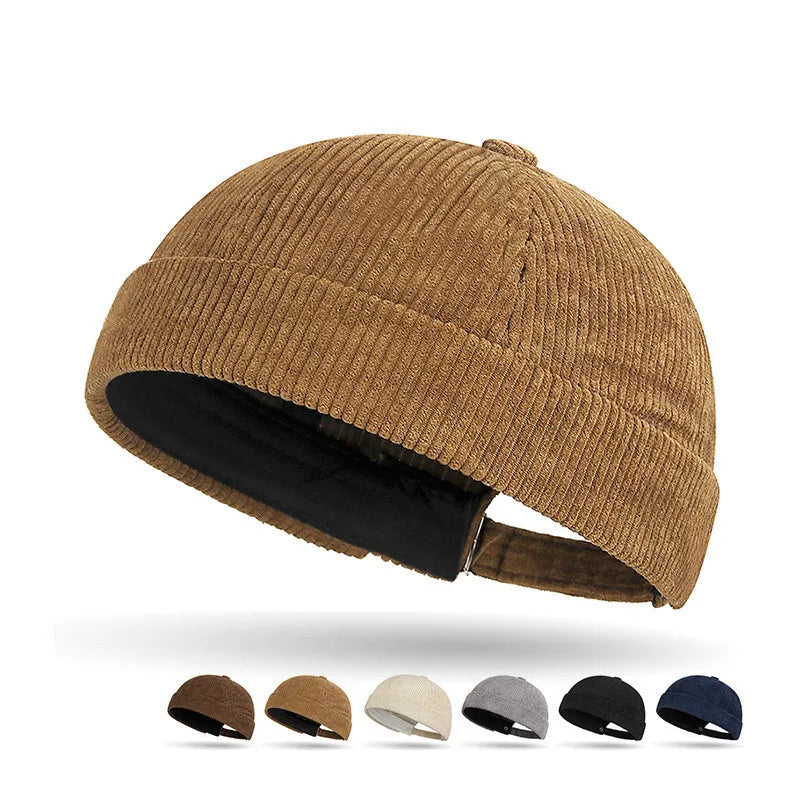 Brown brimless tank style cap with color swatches below on a white background