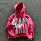 Pink streetwear vintage hoodie with white text saying PEACE.