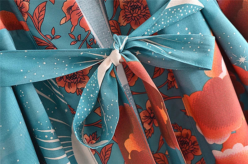 Close-up of floral-patterned fabric with a blue ribbon