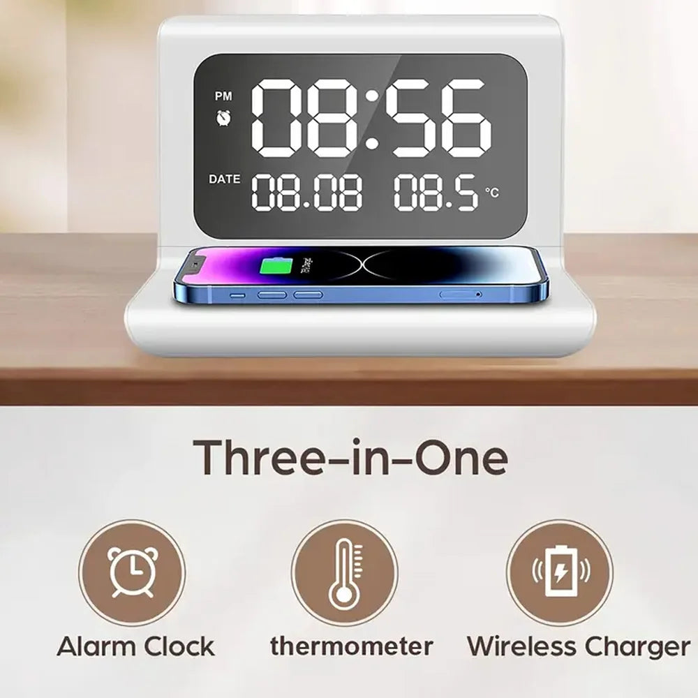 Three-in-one clock with wireless charging pad on a wooden surface